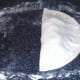 Empty pastry half is folded over filling