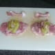 Arranging stuffing on chicken thigh fillets