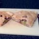 Pasty is cut in half for service