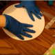 Press down evenly to secure the glue to the cardboard.