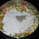 Step two: Combine the Veggies with the flours and spice powders as per instructions. Make a soft dough out of it.