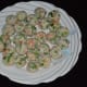 Make small lemon-sized balls out of the dough. Arrange them on a plate.