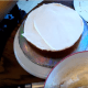 Spread the frosting evenly along the entire top of this layer.