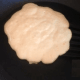 Allow the pancake to cook until the edges start to bubble and dry out a bit. You might even see a little browning. It's time to flip!