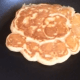After the pancake is flipped, allow it to cook on the other side for a few minutes. If you want to make sure that the center is done, insert a toothpick or a butter knife into the center. If it comes out clean, your pancake is done!