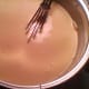 Whisking cheeses until smooth