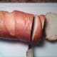 Prep Work: Slicing the French bread with serrated knife.