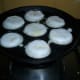 Making lentil and rice dumplings