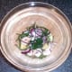 Samphire, king prawn and pineapple salad is ready for plating
