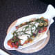 Samphire is scattered over cod and vegetable pasta