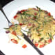 Cutting in to samphire, tomato and red onion tortilla