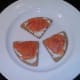 Smoked salmon is laid on oatcakes