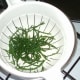Blanched samphire is drained and left to cool slightly