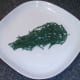Samphire is arranged as a bed for cod