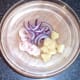 Prepared red onion and pineapple with king prawns