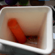 minnesota-cooking-carrots-using-a-salad-shooter-to-grate