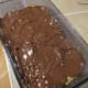 The chocolate and peanut butter layer over the bottom oatmeal layer.