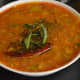 The raw tomato and onion sambar, ready to eat.