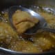 Frying the samosas