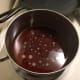 The sauce starts with water and brown sugar.