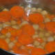Boil the chickpeas and carrots.