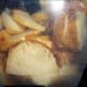 thinly sliced baked potato with the skins on