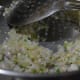 Sauteing onion, ginger, green chlili, and garlic