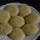 Arrange semolina dumplings on a serving plate.