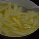 Immerse potatoes in boiling water. Add vinegar or lemon juice and corn syrup or corn flour.