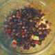 Put the grape halves into the mixing bowl.