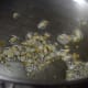 frying chopped garlic