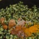 Step four: Add turmeric, salt, jaggery, and tamarind pulp to the mix.