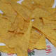 Step six: Fry the triangles in oil. When they are crispy, transfer them to an absorbent paper towel.
