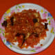 The fried onion, tomato, coriander, cashew nuts, almonds, and red chili, ready for grinding.