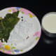 Step 3: Grind oregano leaf mix with grated coconut and curd.