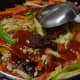Step six: Add tomato sauce, soy sauce, and vinegar.