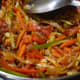 Step seven: Stir-cook the veggies with the sauces.
