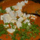 Step nine: Throw in paneer cubes.