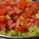 Step two: Add tomato to the pan.