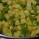 Step one: Stir-fry the potato and capsicum in mustard seeds tempering.
