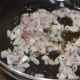Sauté the cumin seeds and chopped onion.