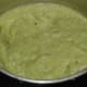 Step two: Grind the green chilies and chopped raw mango together in a mixer or blender
