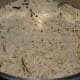Step eight: When the pressure releases completely, open the cooker lid and puff cumin rice with a fork