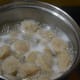 Boil the soya in water for 10 minutes, then squeeze out the excess water.