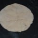 Step six: Roll it to get a medium thick, round pancake