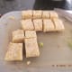 9. The tempeh should be in about 1-inch cubes. If you cut them too small, they may fall apart. Cut the onion from top to bottom into 1-inch cross sections.