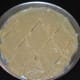 Step 3: Add cardamom powder. When the mix starts leaving the bottom, transfer it to a greased plate. Cut the burfi into pieces when still warm.