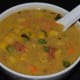 Step ten: Creamy corn soup is ready to serve. Serve it hot, garnished with freshly chopped basil.