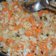 Step four: Throw chopped cabbage and carrot into the pan. Stir-cook for 2-3 minutes on low heat.