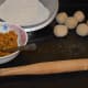 Step eight: Assemble the items for rolling the parathas.
